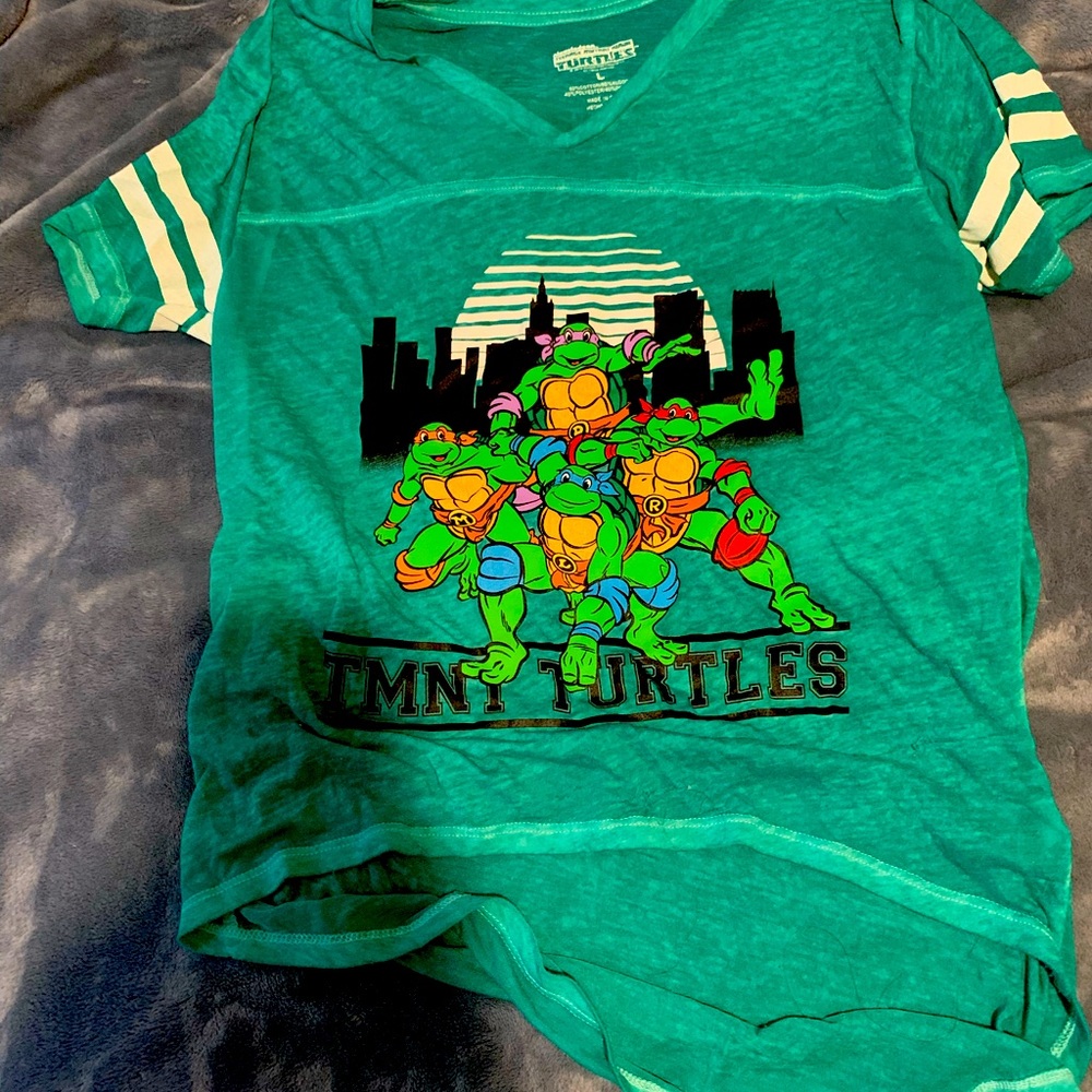 Green TMNT t shirt.. it’s sheer so wear something underneath.